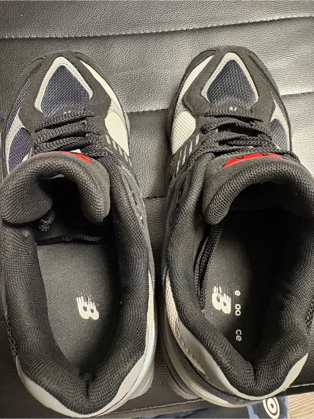 New Balance Kids Black and Gray Athletic Sneakers with Red Logo Accent